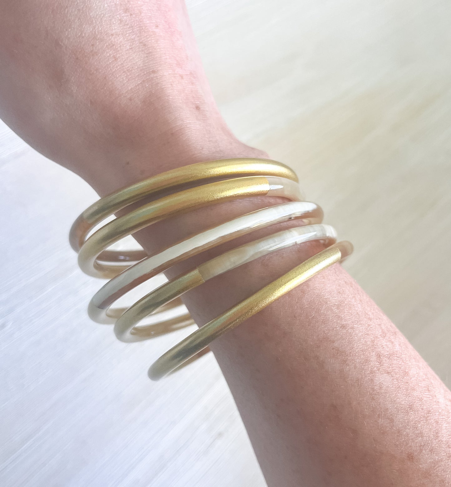 Gold horn bangles
