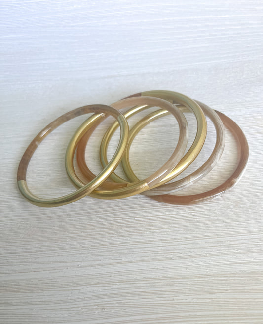 Gold horn bangles